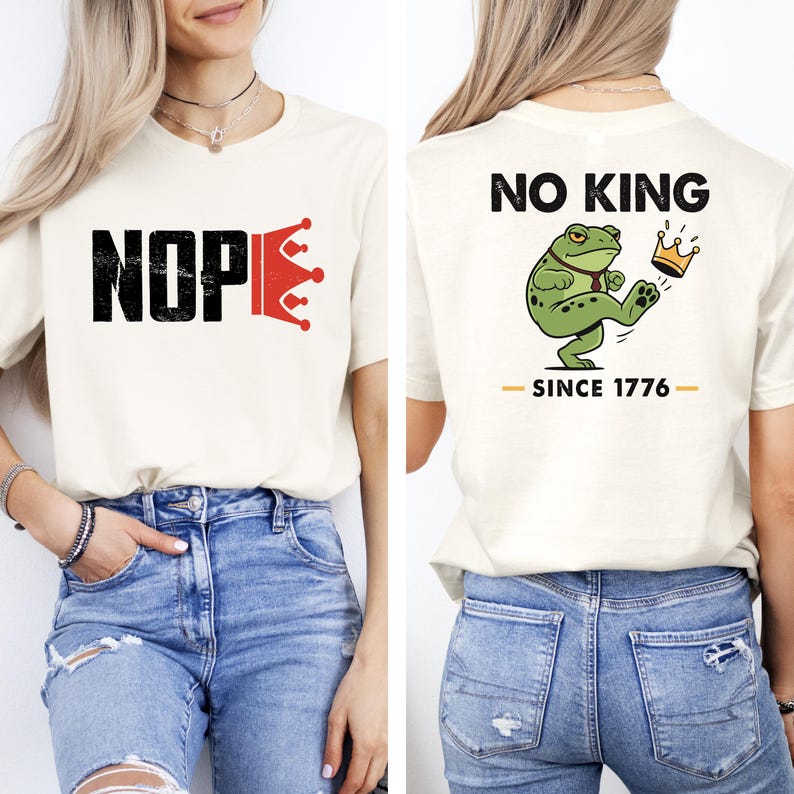 May include: Cream-colored t-shirt with the word "NOPE" in black, a red crown, and a distressed font. The back of the shirt features a green frog with a crown and the text "NO KING - SINCE 1776".