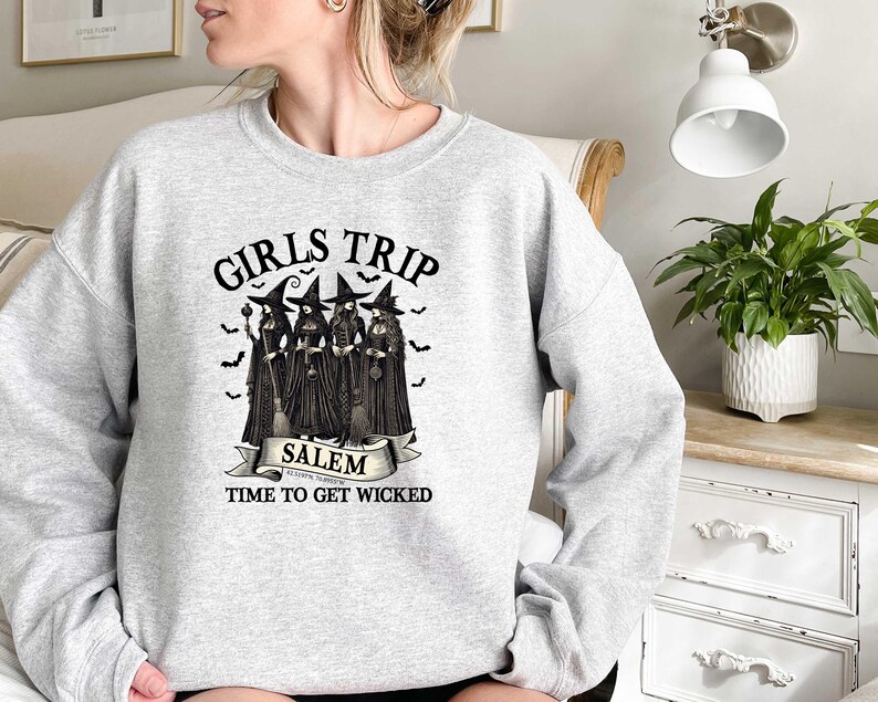 May include: Gray sweatshirt with a black and white graphic of four witches with the text "Girls Trip Salem, Autumn's Magic, Time to Get Wicked".