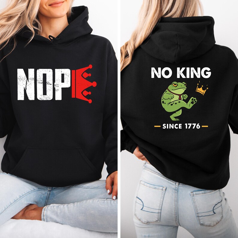 May include: Black hoodie with the word "NOPE" in white block letters and a red crown graphic. The back of the hoodie features a green frog with a crown and the text "NO KING SINCE 1776".