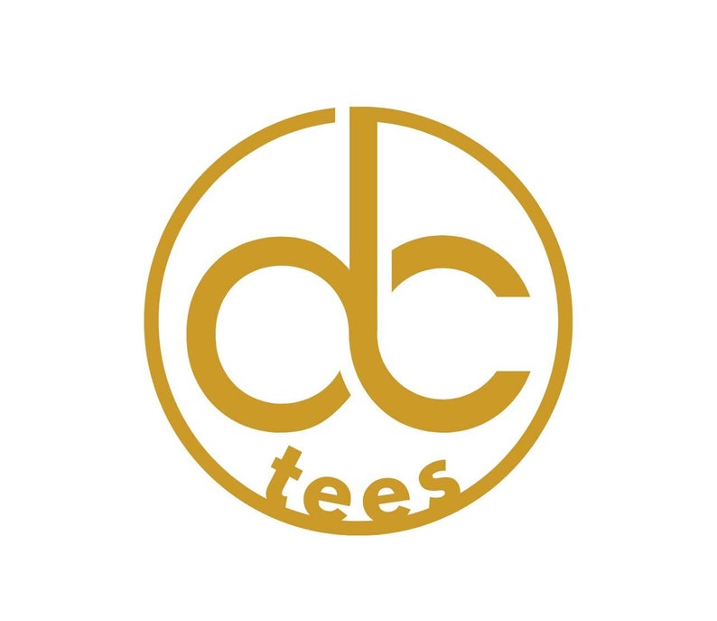May include: Gold logo featuring the letters "dc" within a circle, with the word "tees" underneath. The design is minimalist and contemporary, on a white backdrop.