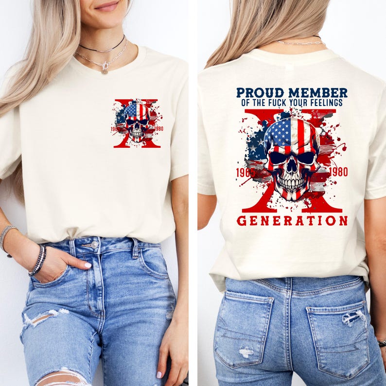May include: Cream-colored t-shirt featuring a skull design with an American flag motif and the text "1980". The back of the shirt displays the text "PROUD MEMBER OF THE FUCK YOUR FEELINGS" above a skull design and the word "GENERATION".