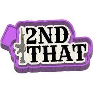 May include: A purple and white cookie cutter in the shape of the text "2ND THAT" with a rifle graphic. The cookie cutter has a rectangular shape with a smaller rectangular shape on the left side.
