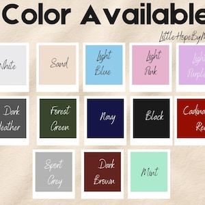 May include: Image displaying a color chart with the text "Color Available" at the top and "Little Hope By Mason" in the upper right corner. The chart features color swatches labeled: White, Sand, Light Blue, Light Pink, Light Purple, Dark Heather, Forest Green, Navy, Black, Cardinal Red, Sport Grey, Dark Brown, and Mint.