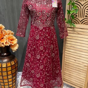 Teens Net heavy party wear dress with mirrors