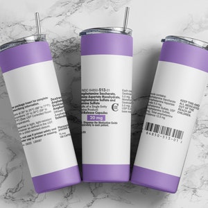 Può includere: Un bicchiere termico in acciaio inossidabile di colore viola con un'etichetta bianca che riporta "NDC 64850-513-01" e "20 mg" con un codice a barre in basso. L'etichetta include anche il testo "Tenere questo e tutti i farmaci fuori dalla portata dei bambini."