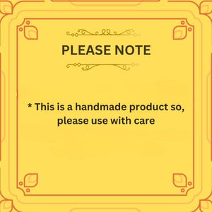 May include: A yellow square with an orange border and decorative corner elements. The text "PLEASE NOTE" is at the top, with the message "This is a handmade product so, please use with care" below.