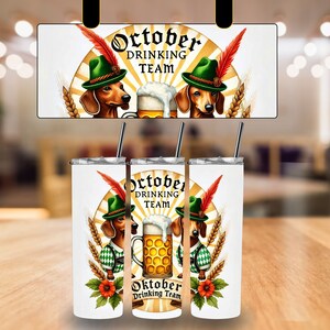 May include: Two dachshund dogs wearing green hats with feathers, holding mugs of beer. The mugs are decorated with a gold and white pattern. The background is a white and yellow sunburst pattern with the text "Oktober Drinking Team".