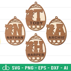May include: Four wooden Easter egg ornaments with bunny silhouettes and the names Toby, Nathan, Archie, and Harper.