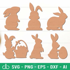 Peut inclure: Ensemble de six fichiers de découpe SVG de lapins de Pâques. Les lapins sont dans différentes poses, y compris tenant un œuf et un panier d'œufs. Les fichiers sont parfaits pour créer des décorations de Pâques, des cartes et de l'artisanat.
