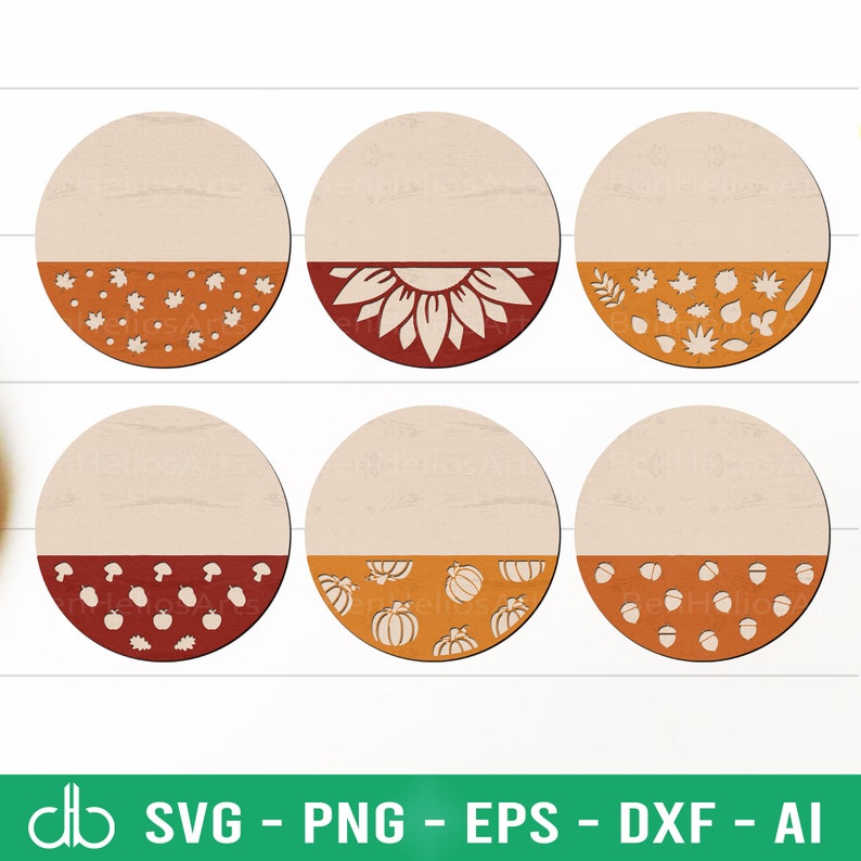 Peut inclure: Six disques en bois ronds avec une moiti&eacute; sup&eacute;rieure vide et un motif sur le th&egrave;me de l'automne sur la moiti&eacute; inf&eacute;rieure. Les motifs comprennent des feuilles, des citrouilles, des glands et un tournesol.