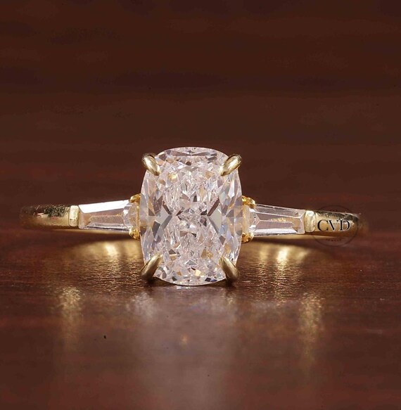 Elongated Cushion Cut Cvd Diamond With Side Baguettes,three Stone