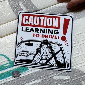 Precaución: Aprendiendo a conducir - Imán para coche, Regalo divertido para conductores noveles, Calcomanía para estudiantes de conducción, NIÑA