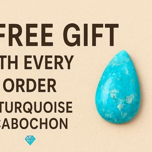 May include: A turquoise cabochon gemstone, teardrop-shaped, on a beige background. The text reads "FREE GIFT WITH EVERY ORDER A TURQUOISE CABOCHON" in dark brown. A small blue diamond graphic is at the bottom.