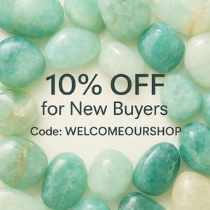 May include: An overhead shot of various polished, rounded gemstones in shades of green and white. The text "10% OFF for New Buyers" is displayed in the center, with the code "WELCOMEOURSHOP" below.