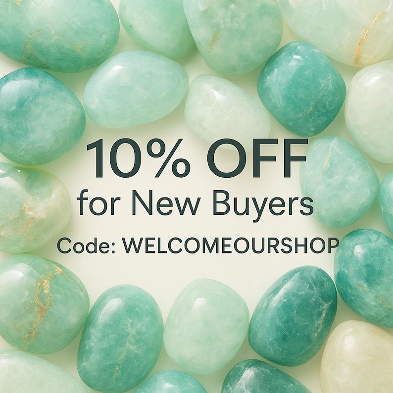 May include: An overhead shot of various polished, rounded gemstones in shades of green and white. The text "10% OFF for New Buyers" is displayed in the center, with the code "WELCOMEOURSHOP" below.