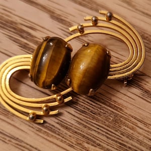 Vintage goldtone brooch with double tiger eye design