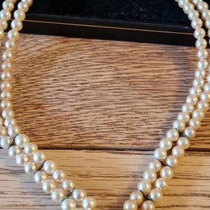 Vintage Sphinx 2 strand faux pearl necklace with integral heart pendant