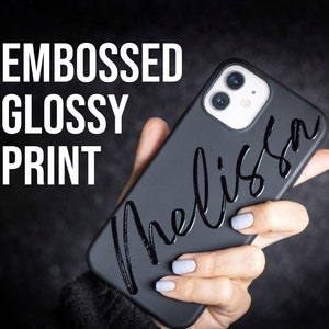 May include: Black phone case with a glossy, embossed print of the name "Melissa".