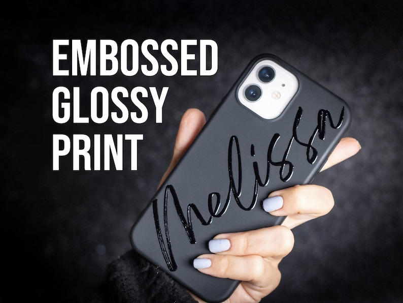 May include: Black phone case with a glossy, embossed print of the name "Melissa".