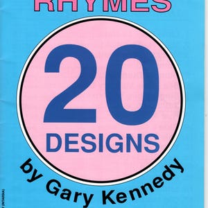 May include: A blue and pink book cover with the title "Nursery Rhymes" and a large pink circle with a blue number "20" and the text "Designs by Gary Kennedy Intarsia".
