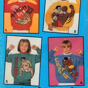 May include: Four knitted sweaters featuring wrestling-themed designs. The sweaters are red, yellow, blue, and green. The designs include wrestlers, sumo wrestlers, and the words "AARGH", "SUMO", and "CRASH".
