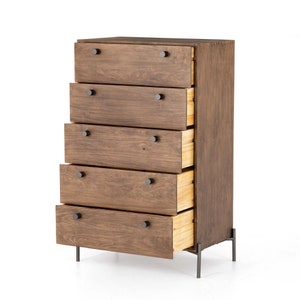 May include: A five-drawer chest of drawers with a dark brown wood finish and black metal legs. The drawers are open, revealing the light wood interior.