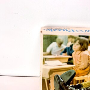 May include: A set of three ceramic mugs with a speckled, matte finish. The mugs are in shades of cream, light gray, and dark gray. Each mug has a simple, minimalist design and a rounded handle. Perfect for coffee or tea.