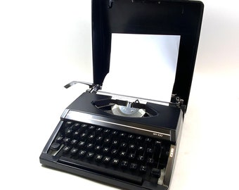 Vintage 1970s Silver Reed 720 Portable Manual Grey Typewriter With