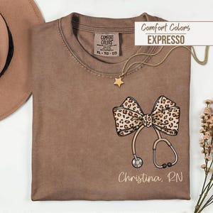 Personalized Nurse T Shirt, Comfort Colors Leopard Bow Stethoscope Tee, Custom Nursing Student Gift,Nurse Graduation Appreciation Sweatshirt