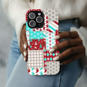 May include: A patchwork-style phone case featuring a festive Christmas design. The case incorporates various patterns, including snowflakes, gingerbread men, Christmas trees, and ornaments. The color palette includes red, teal, white, and tan, creating a holiday theme.