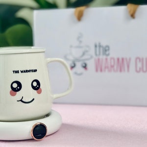 The WarmyCup: Elevate your coffee and tea experience with the meticulously crafted Mug and Warmer Pad Set.