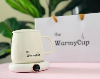 The WarmyCup: Elevate your coffee and tea experience with the meticulously crafted Mug and Warmer Pad Set.