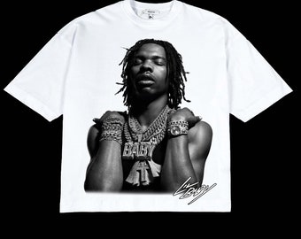 May include: White t-shirt with a black and white photo of a man wearing a large chain necklace with the word "BABY" on it. The man is wearing a watch and has his arms crossed. The signature "Lil Baby" is printed below the photo.