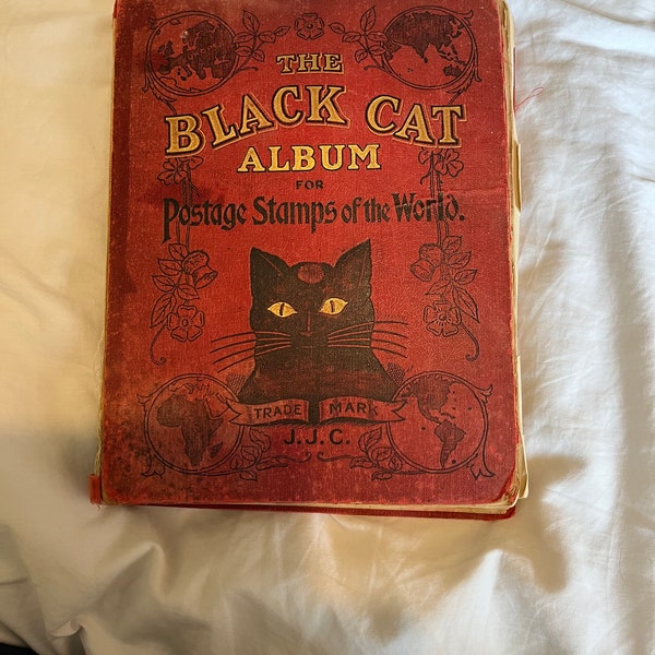 A Rare Black Cat Stamp Book with Rare Stamps from around the World