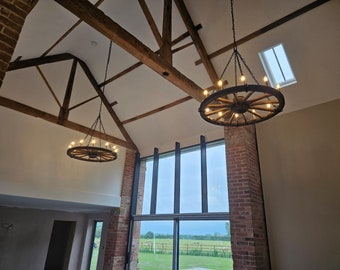 Handmade Wagon Wheel Chandelier: Rustic Medieval Lighting