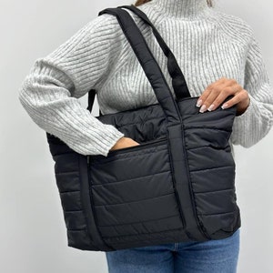 Wasserabweisende gesteppte Einkaufstasche, leichte schwarze Schultertasche, geräumige A4-Arbeits- oder Laptoptasche, stilvolle Alltagstasche mit Reißverschluss