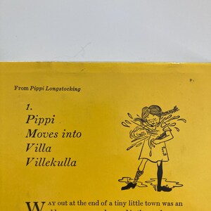 May include: A yellow book page featuring the text From Pippi Longstocking, 1. Pippi Moves into Villa Villekulla, and a black and white line drawing of a girl with braided hair splashing water. The text begins with a large W and describes a house.