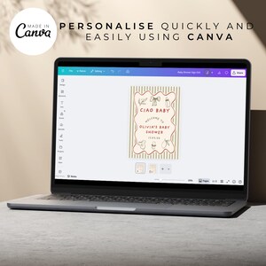 May include: A laptop displays a baby shower sign design. The sign features the text "CIAO BABY" and "WELCOME TO OLIVIA'S BABY SHOWER" in a decorative frame. The Canva logo is visible in the upper left corner.