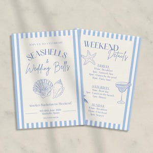 May include: Two-page invitation with a light blue and white striped border. The left page reads "Seashells & Wedding Bells" with seashell illustrations. The right page lists weekend details with a starfish and cocktail illustration.