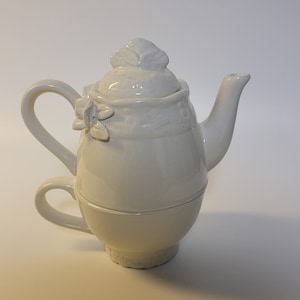 Antique Nesting / Stacking Teapot and Tea Cup set