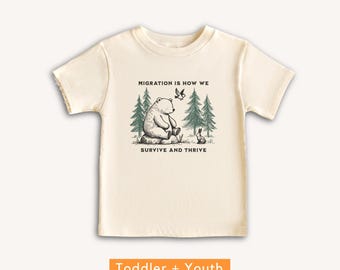 Migration is How We Survive and Thrive Kids T-Shirt
