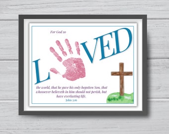 May include: A white background with a pink handprint and the word "LIVED" in blue letters. The word "L" is large and the rest of the word is smaller. There is a wooden cross on a green hill with the text "For God so loved the world, that he gave his only begotten Son, that whosoever believeth in him should not perish, but have everlasting life. John 3:16."