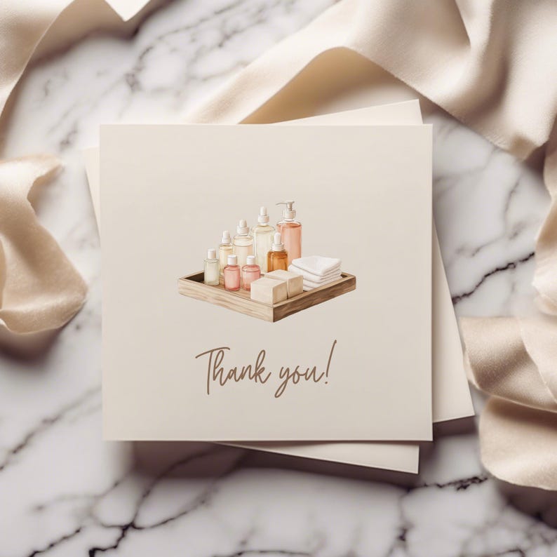 May include: A thank you card with a watercolor illustration of a wooden tray filled with various bottles of bath and body products, including soaps and lotions. The text "Thank you!" is written in brown cursive.