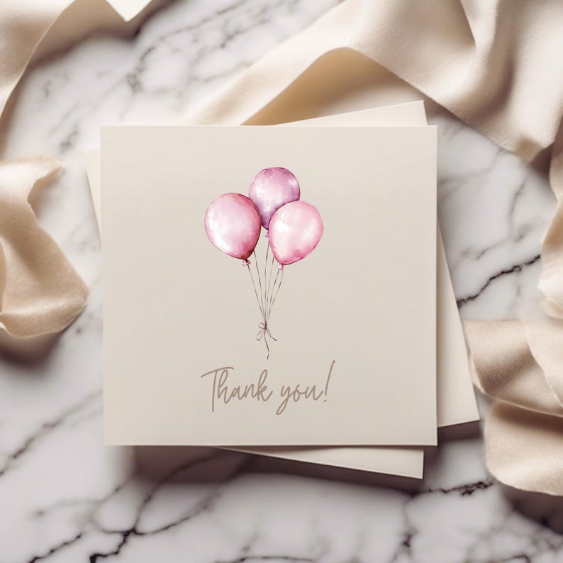 May include: A thank you card with a watercolor illustration of three pink balloons. The card has the text "Thank you!" printed on it.