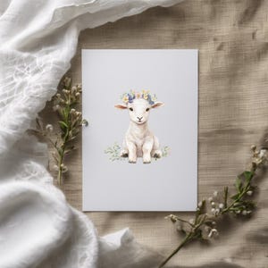 May include: A watercolor illustration of a white lamb wearing a flower crown. The lamb is sitting on a light gray background with green leaves and flowers.