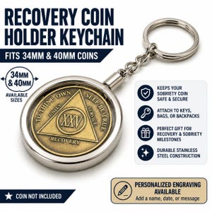 May include: A silver-toned metal recovery coin holder keychain designed to fit 34mm and 40mm coins. The circular frame holds a bronze-colored coin featuring a triangle with the Roman numeral XXV, the words To Thine Own Self Be True, Unity, Service, and Recovery.