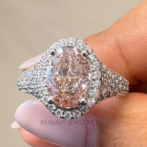 Oval Pink Lab Grown Diamond Engagement Ring: Round Diamond Halo, Unique Design