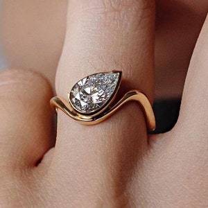 2.00 CT Pear Cut Lab Grown Diamond Engagement Ring: 18K Yellow Gold Bezel Solitaire