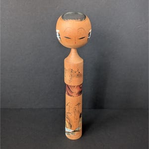 Vintage Japanese Kokeshi Doll With Hand-Painted Details & Red Bow