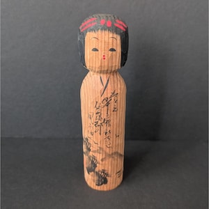 Hand-Carved Japanese Kokeshi Doll With Painted Details & Signed Base